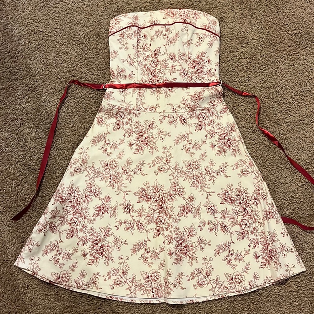 Strapless red and cream colored dress with red satin tie, size 3